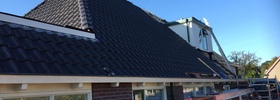 Dakrenovatie wolfskap boerderijwoning